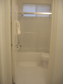 The bathroom of the 1BR/1BA Condominium Vacation Rental in Santa Monica, California that is 770 square foot, white-on-white gem and can be a corporate rental, vacation rental or event rental. The condo in Santa Monica, CA is in a great vacation home rental location near the Montana shopping district, the 3rd Street Promenade, Palisades Park, downtown Santa Monica, Brentwood and the Pacific Ocean