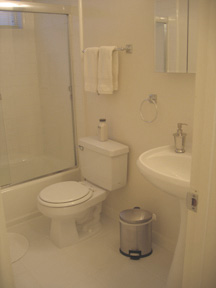 The bathroom of the 1BR/1BA Condominium Vacation Rental in Santa Monica, California that is 770 square foot, white-on-white gem and can be a corporate rental, vacation rental or event rental. The condo in Santa Monica, CA is in a great vacation home rental location near the Montana shopping district, the 3rd Street Promenade, Palisades Park, downtown Santa Monica, Brentwood and the Pacific Ocean